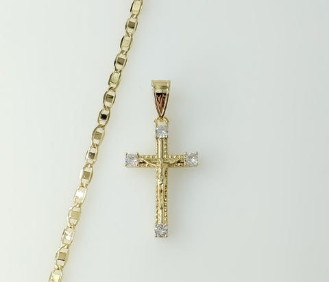 Gold plated small cross pendant on a flat mariner anchor chain necklace.

Gold plated anchor chain with a small cross pe