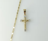 Gold plated small star-shaped chain necklace with a cross charm.