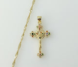 Gold plated Jesus crucifix pendant on a 14K gold twist chain necklace.