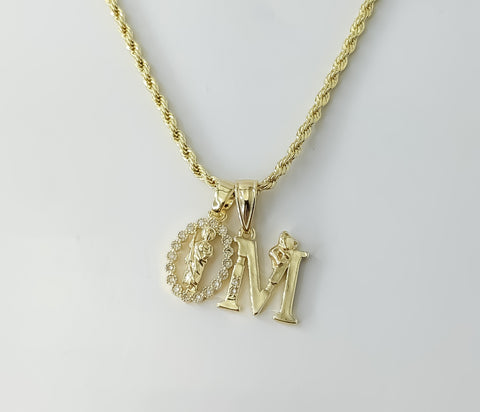 Gold plated double Saint Jude pendants on a braided chain necklace.
A dainty rope braided chain necklace with double Sai