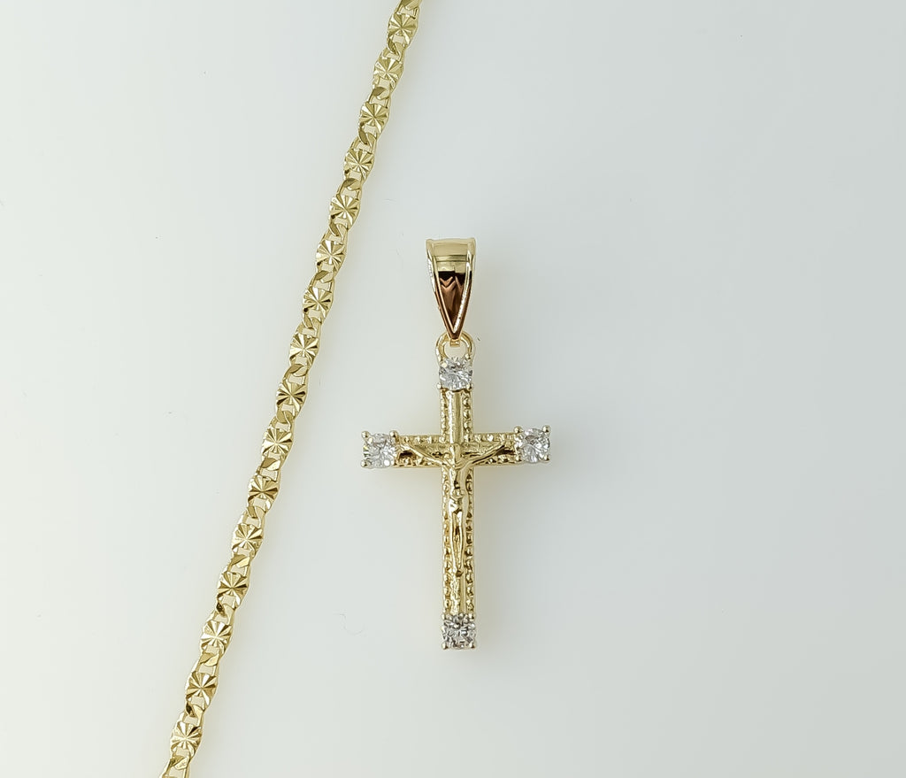 Gold plated small star design necklace with delicate chain chain detail.
Gold plated small cross pendant hanging from a