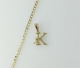 A delicate 14K gold plated Cuban chain necklace with a small letter K pendant.

A 14K gold plated dainty Cuban chain nec