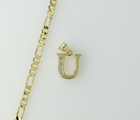 A 3mm figaro chain necklace with a dainty plated letter "U" pendant.

A dainty plated necklace featuring a small figaro