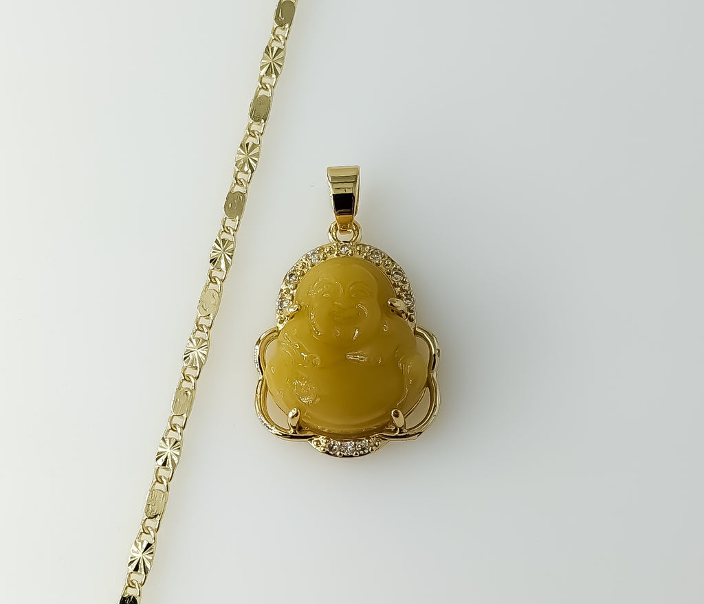 Gold plated Buddha pendant hangs from a dainty solid 2mm star chain necklace.