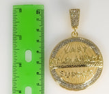 A gold-plated pendant featuring an intricately detailed The Last Supper scene.
A gold-plated pendant depicting a close-u